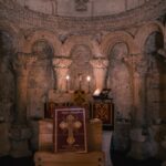 Ancient stone church interior with altar and altar
