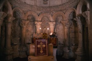 Ancient stone church interior with altar and altar